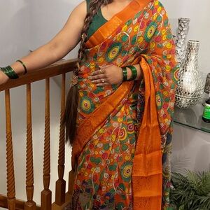 Vibrant Orange and Green Floral Saree